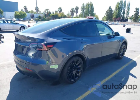 2023 Tesla Model Y Awd/Long Range Dual Motor All-Wheel Drive из США, поврежденный, VIN 7SAYGAEE3PF756915